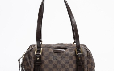 Louis Vuitton: A "Rivington" bag of brown Damier Ebene canvas, leather trimmings, gold tone hardware and two handles. – Bruun Rasmussen Auctioneers of Fine Art
