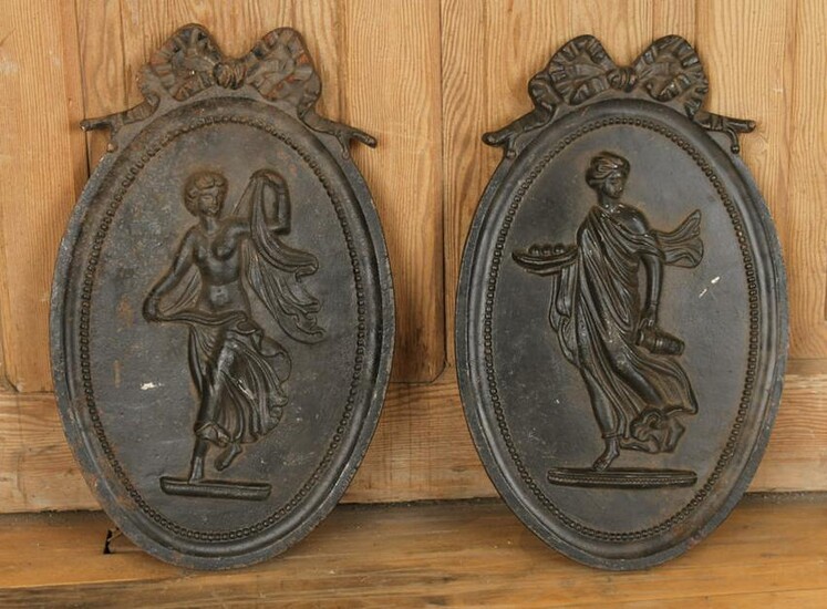 PAIR OVAL CAST IRON PLAQUES DANCING WOMEN