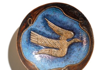 PIETRO MELANDRI Plate decorated in relief with a dove, Faenza.