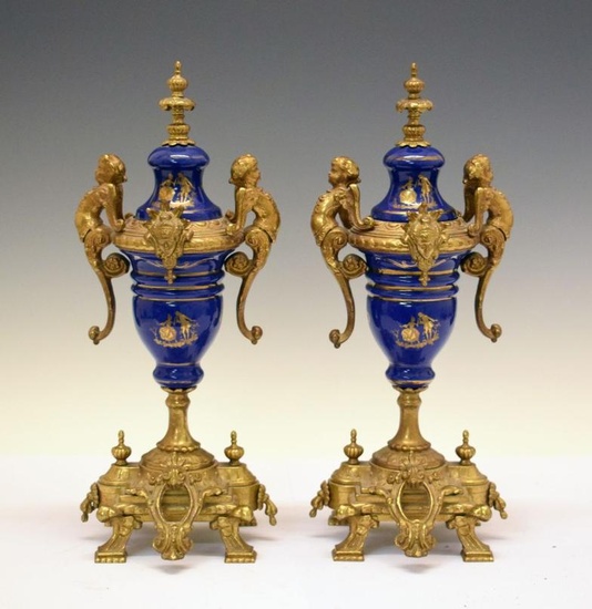 Pair of Continental gilt metal and ceramic urns, 35.5cm...