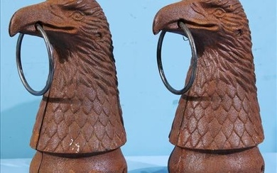 Pair of cast iron eagle head hitching post toppers