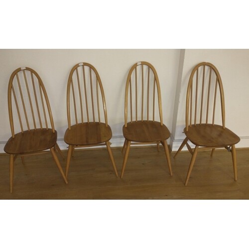 Set of 4 Ercol dining chairs - some minor damage to the top ...
