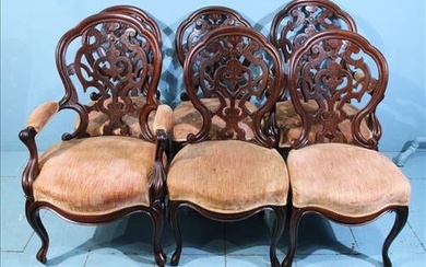Set of 6 carved dining chairs, 4 side and 2 arm attrib. to Meeks