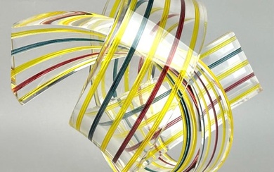 "Sunglasses", a swirl of yellow, red, clear and blue ribbons.