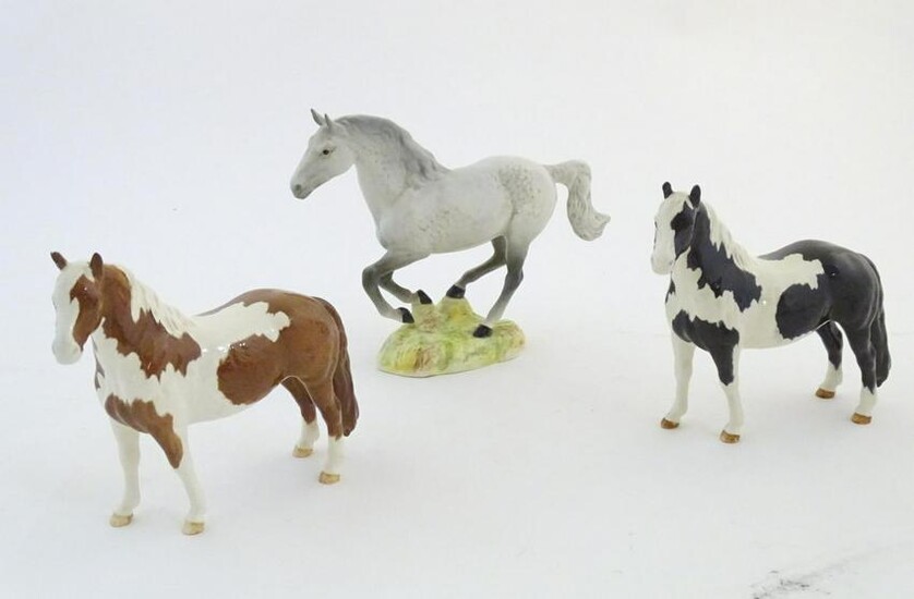 Three Beswick horses comprising Galloping Horse, model