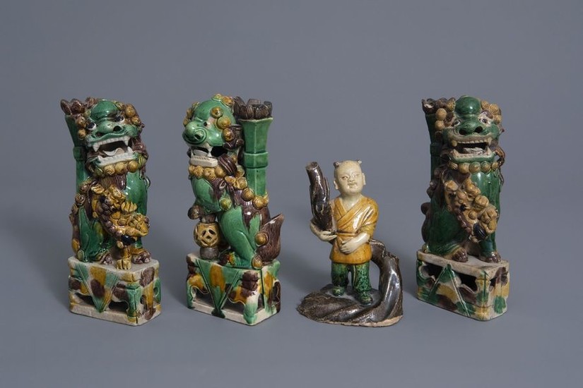 Three Chinese famille verte biscuit models of Buddhist...