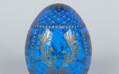 Verrerie: Oeuf en cristal bleu gravé rehauts d'or signé FABERGE 219/500 H:9cm