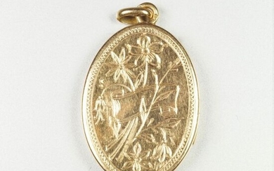 18 karat yellow gold pendant with a photo holder Weight 4.9 grs.