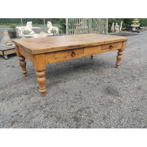 20th C. Pine table with two drawers in the frieze raised on ...