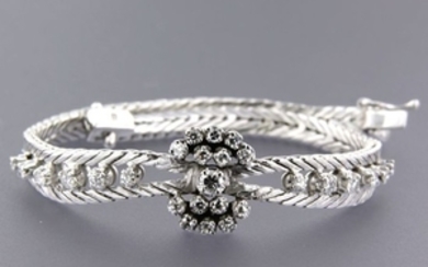 18 kt white gold bracelet set with brilliant- and single-cut diamonds, approx. 0.78 ct in total