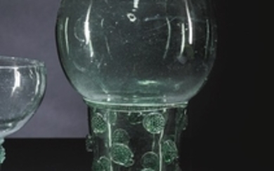 A large Dutch or German green-tinted glass roemer, 17th century