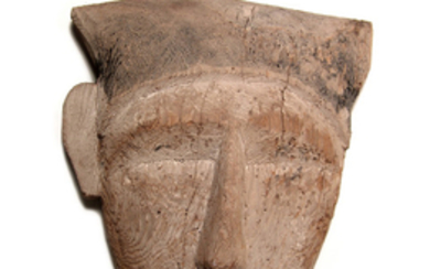 An Egyptian wood 'mummy' mask, Late Period