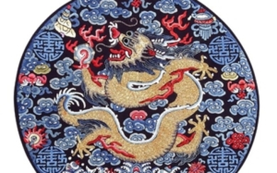 AN EMBROIDERED NAVY BLUE SILK DRAGON ROUNDEL, LATE QING DYNASTY