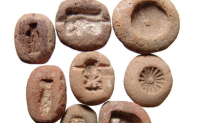 8 beautifully detailed Egyptian terracotta amulet molds
