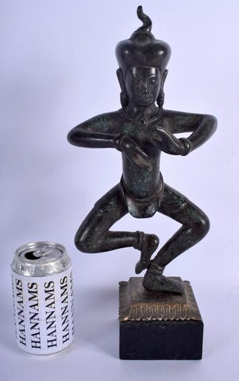 A 19TH CENTURY SOUTH EAST ASIAN BRONZE FIGURE OF A