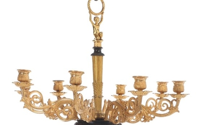 SOLD. A 19th century Empire gilt and patinated bronze chandelier with eight light arms. H. 45/113. Diam. 45 cm. – Bruun Rasmussen Auctioneers of Fine Art