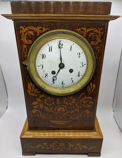 A 19th century French marquetry inlaid mantle clock