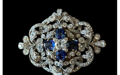 A 19th century sapphire and diamond scroll brooch / pendant,...