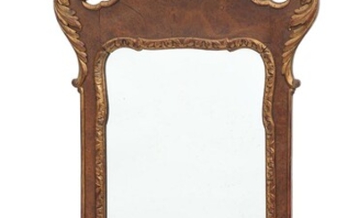 NOT SOLD. A 20th century Rococo style partly gilded root wood mirror, carved with rocailles and foliage. H. 87. W. 50 cm. – Bruun Rasmussen Auctioneers of Fine Art