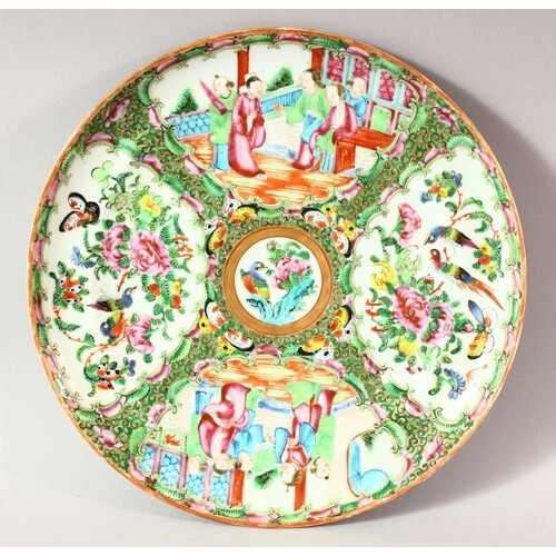 A CHINESE CANTON PORCELAIN PLATE, decorated with panels of f...