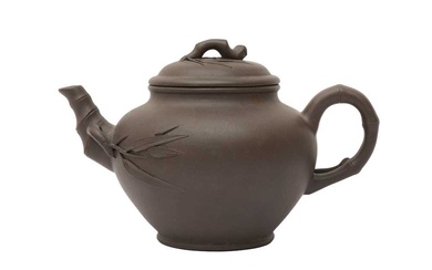 A CHINESE YIXING ZISHA 'BAMBOO' TEAPOT AND COVER 宜興紫砂竹紋壺 《范愛雲製》款