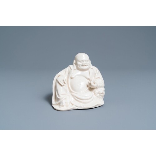 A Chinese Dehua blanc de Chine figure of Buddha, 18/19th C.D...