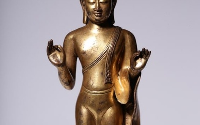 A Chinese Gilt Bronze Figure of Standing Buddha