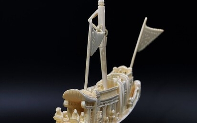 A Chinese bone carved Chinese junk.