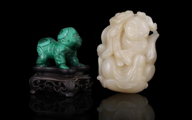 A Chinese celadon jade carving of a boy