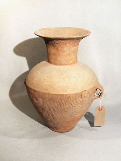 A Chinese pottery two handled vase, Neolithic, 39.5cm high