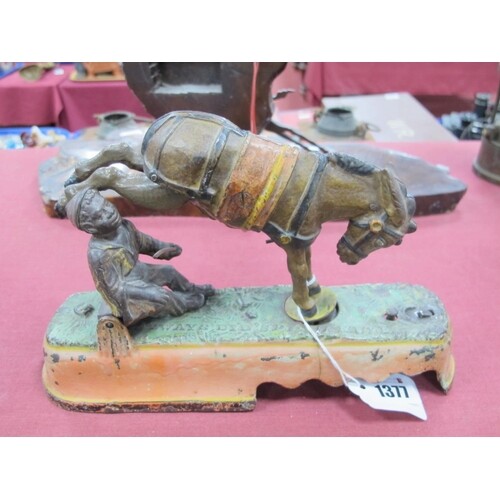 A Cold Painted Cast Iron Moneybox, modelled in the form of a...