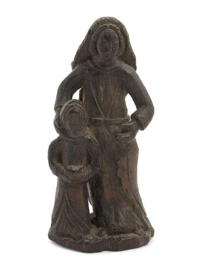A Continental Carved Wood Figure of a Mother and Child