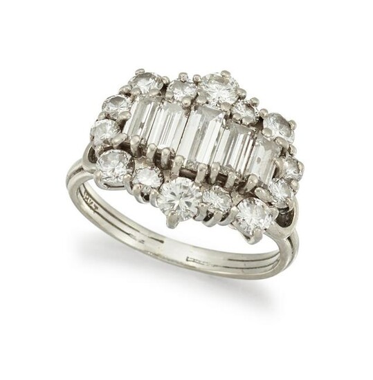 A DIAMOND DRESS RING Centred by a graduated row of
