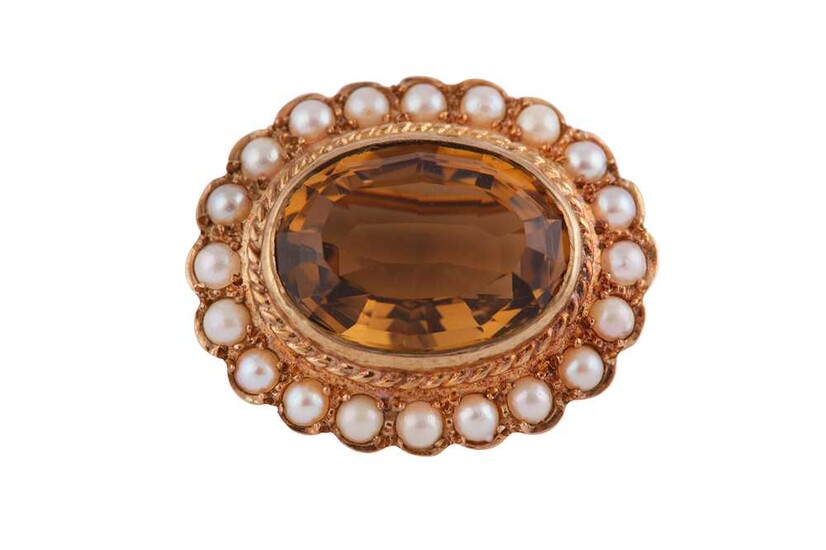 A GEM AND PEARL SET GOLD BROOCH