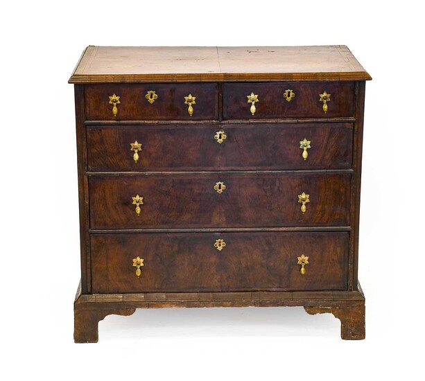 A George I Walnut, Feather-Banded and Crossbanded Straight Front Chest of Drawers