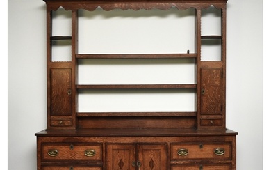 A George III cross-banded oak dresser and rack, Shropshire T...