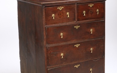 A George III oak chest of drawers, having two short over thr...