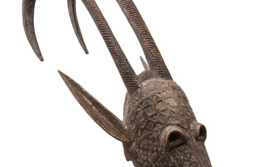 A LARGE CARVED WOOD AFRICAN BOBO ANTELOPE MASK