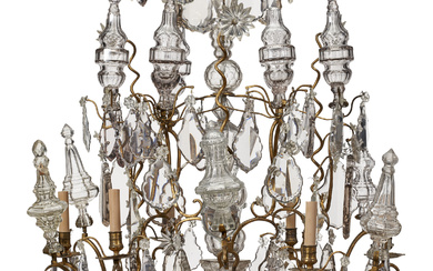 A LOUIS XV ORMOLU AND CUT-GLASS SIX LIGHT CHANDELIER LARGELY...