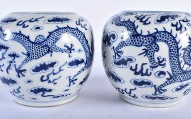 A PAIR OF 19TH CENTURY CHINESE BLUE AND WHITE PORCELAIN GLOBULAR CENSERS bearing Kangxi marks to bas