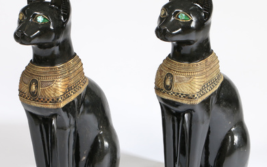 A PAIR OF 20TH CENTURY RESIN EGYPTIAN CATS.