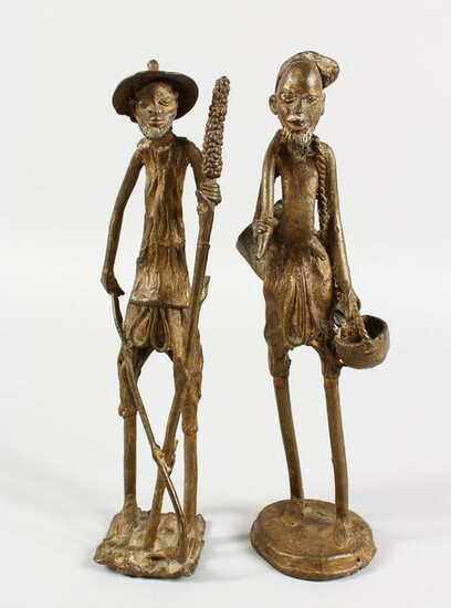 A PAIR OF NATIVE BRONZE LONG FIGURES. 12ins high.