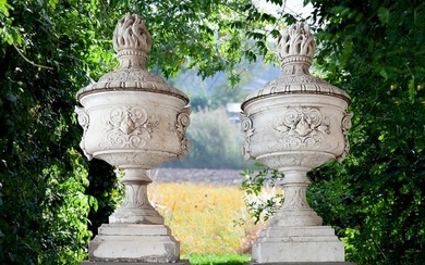 A PAIR OF ORNATELY CARVED WHITE MARBLE URNS AND COVERS, LATE 19TH OR EARLY 20TH CENTURY