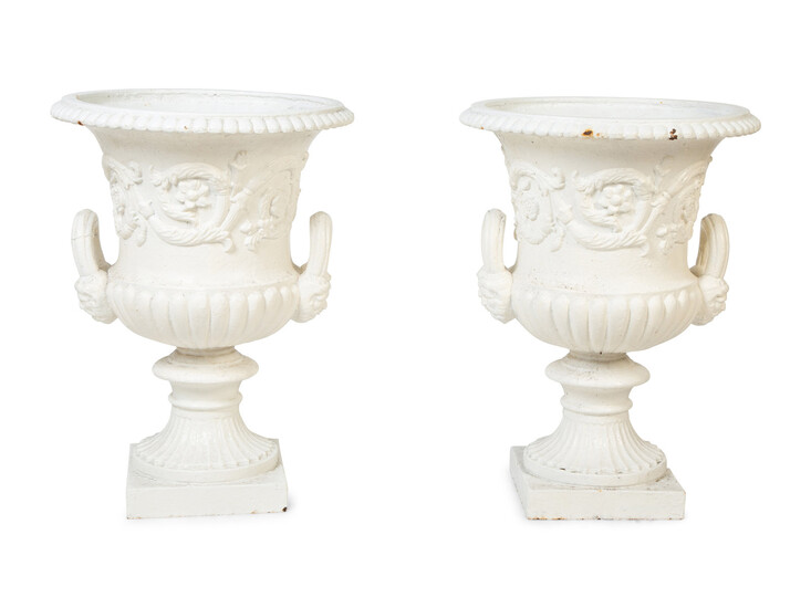 A Pair of Continental Cast Iron Urns