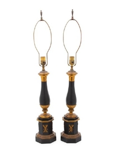 A Pair of Empire Style Ebonized and Gilt Metal Table