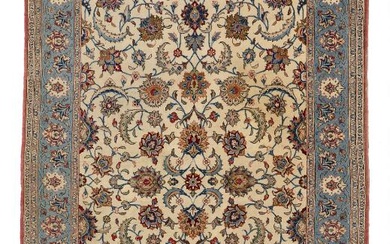 A Qum rug, Persia. All over design of entwined branches and palmettes....