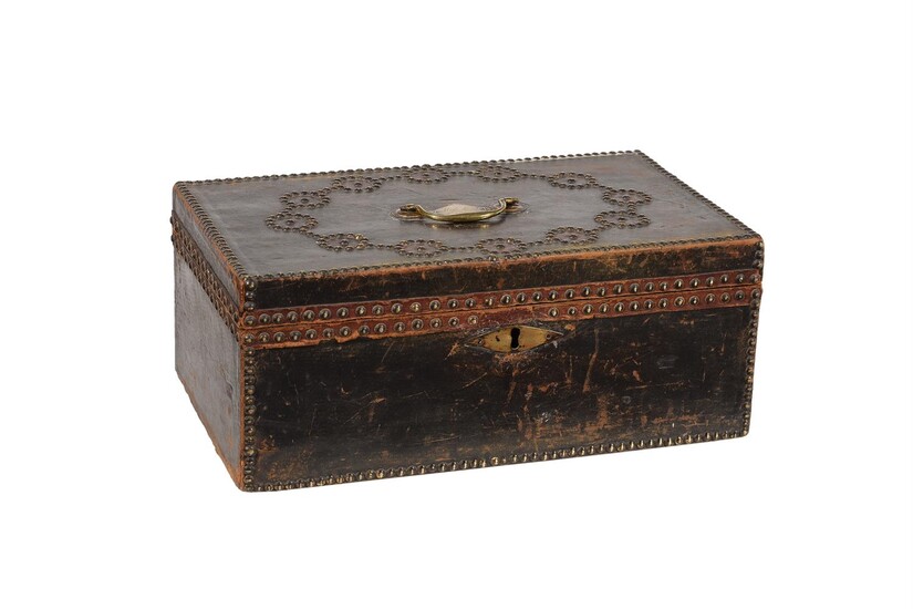 A REGENCY LEATHER AND STUDDED TRUNK, CIRCA 1818