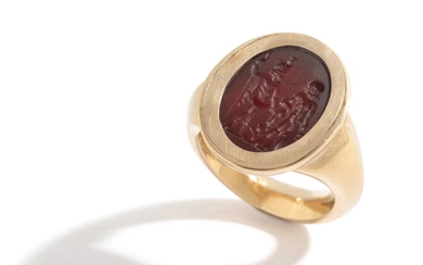 A Roman Carnelian Ring Stone with Two Male Deities and a Child