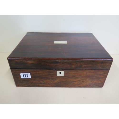 A Rosewood sewing box fitted interior with contents