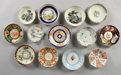 A SMALL COLLECTION OF 19TH CENTURY PORCELAIN SAUCERS